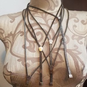 MAC COSMETICS Employee zipper necklace sold indiv